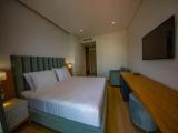 Deluxe Triple room with partial sea view