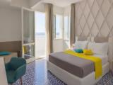 Superior Triple room with balcony and with sea view