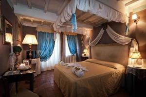 TORRE GIARDINO SEGRETO B&B- Borgo Capitano Collection - Albergo diffuso, San Quirico d'Orcia